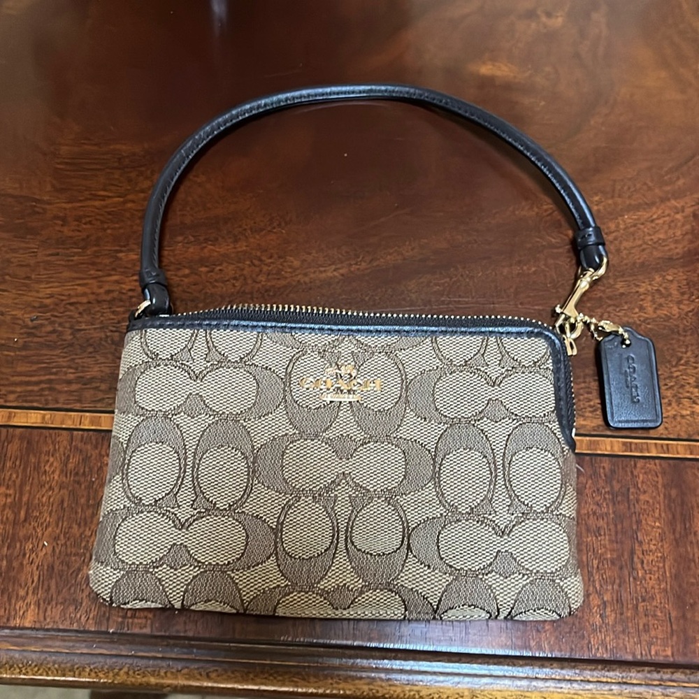 Unused Coach wristlet !